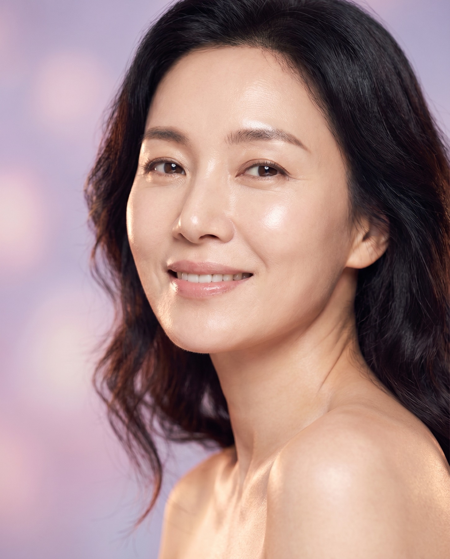 Radiant healthy Asian woman with glowing skin